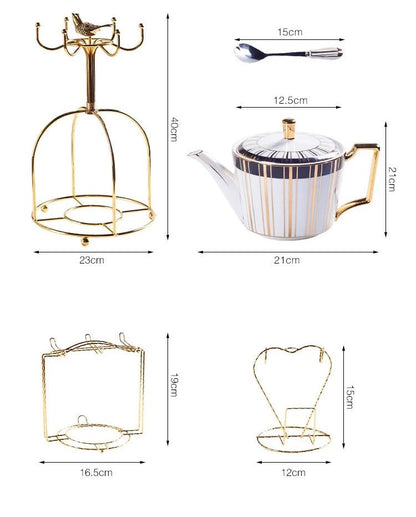 Nordic tea set with porcelain teapot, cups and saucers arranged on table