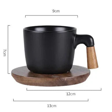Scandinavian ceramic teapot pouring tea into white cup, drip-free spout