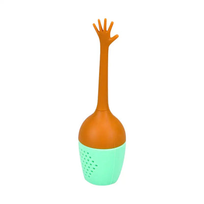 Silicone tea infuser on a saucer with tea cup