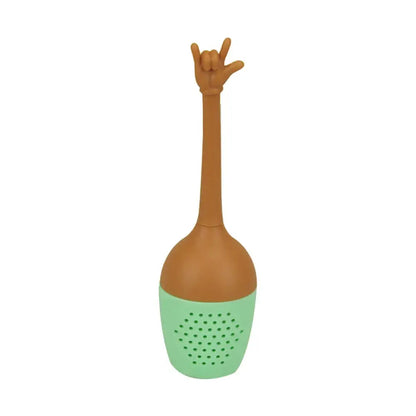 Silicone tea infuser being washed under water