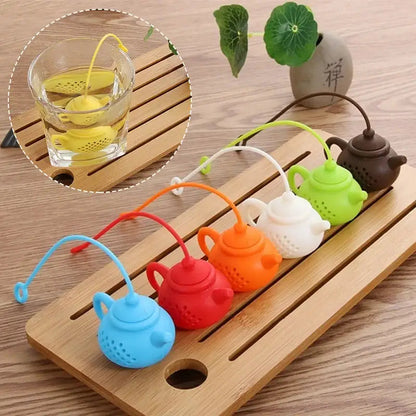 Blue silicone tea infuser in teapot shape