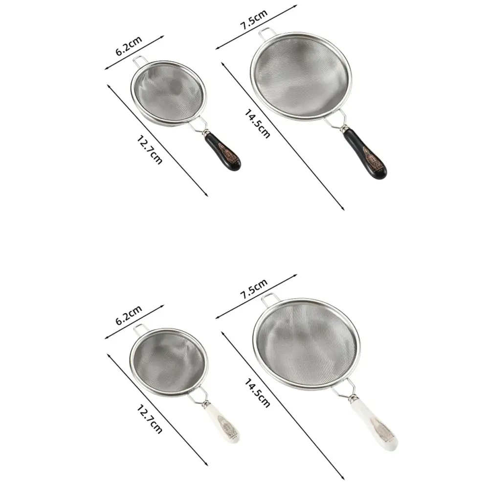Stainless steel tea strainer with a teapot and cups