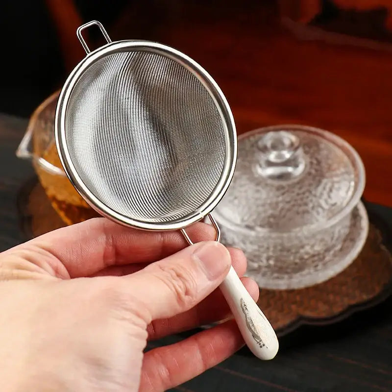 Large silver tea strainer sized for teapots and wide cups