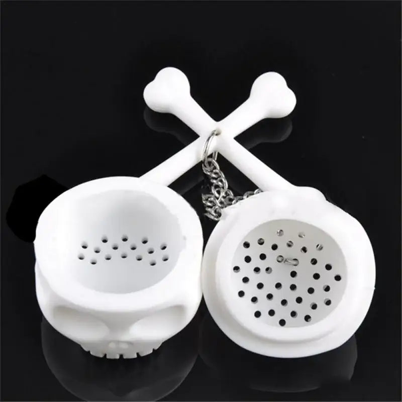 Skull tea infuser in a white mug