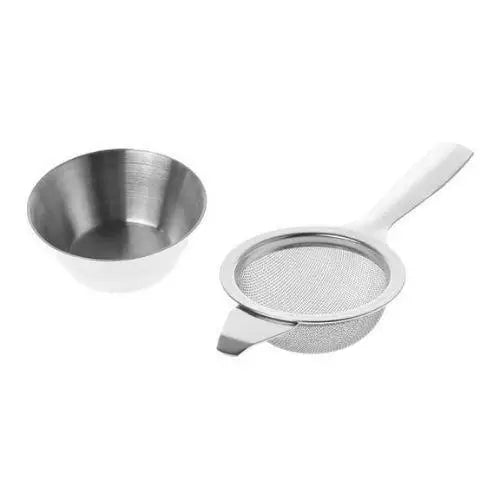 Small stainless steel tea strainer in silver finish on white background