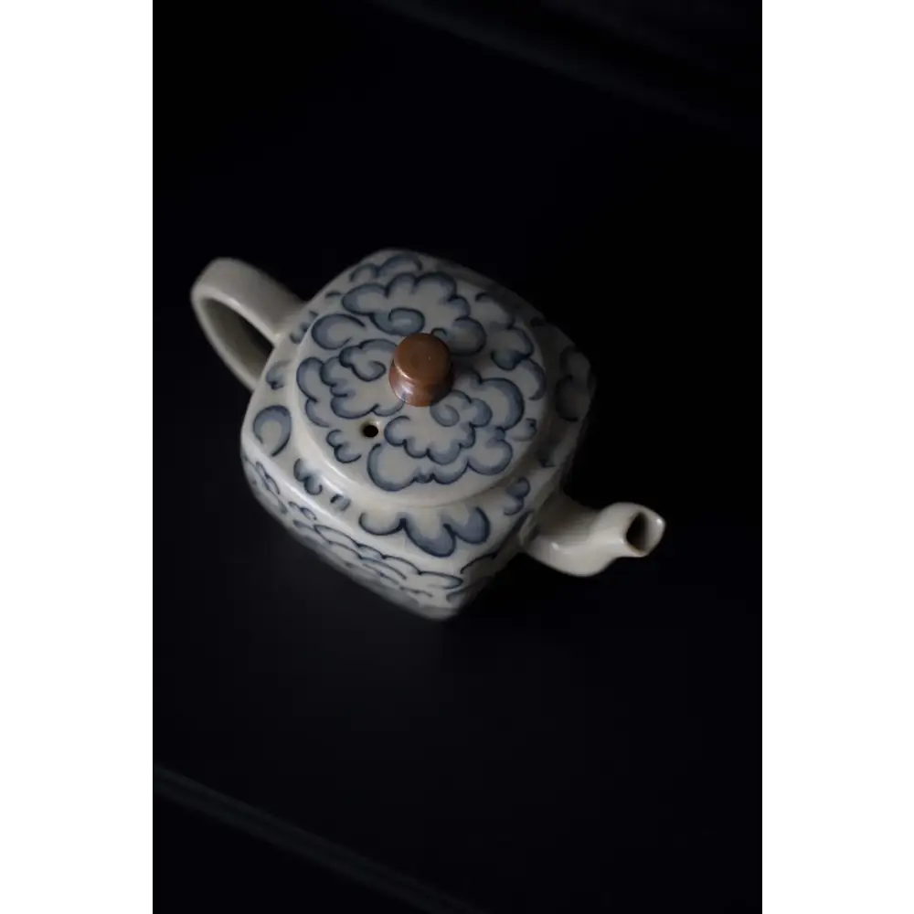 Square porcelain teapot on kitchen counter