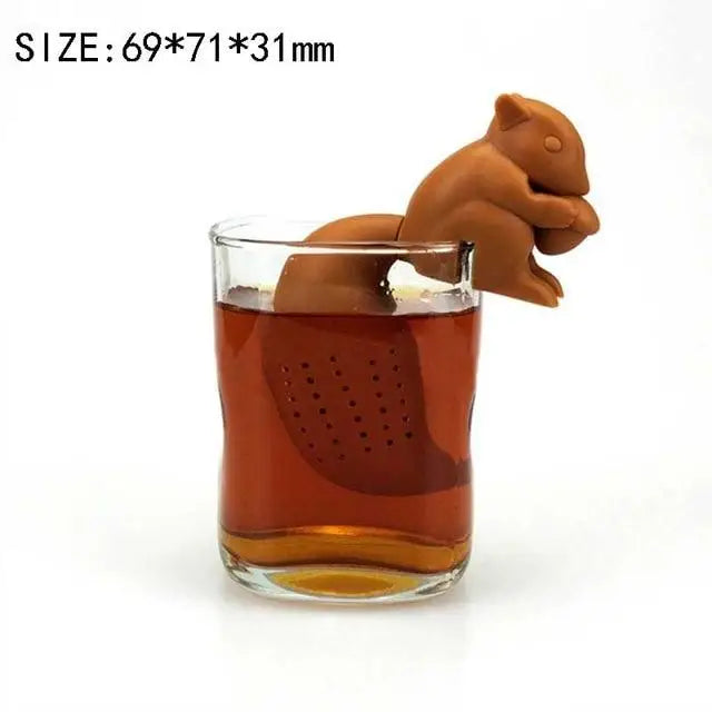 Squirrel silicone loose leaf tea infuser resting on a mug rim
