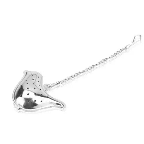 Bird tea infuser steeping in a cup of tea