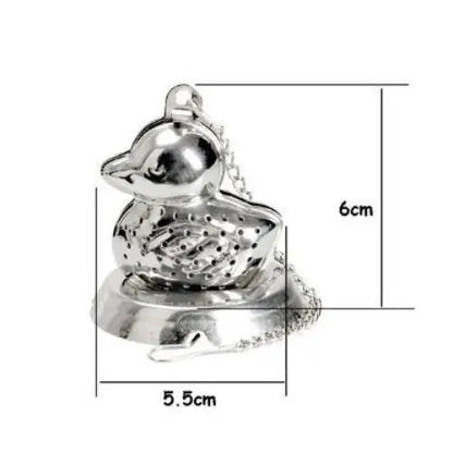 Duck shaped tea infuser sitting on a mug