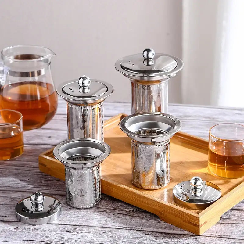 Tea infuser resting on a glass of iced tea