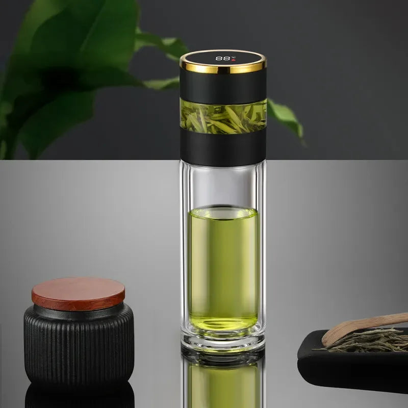 Stainless steel insulated tea infuser bottle, clear color, showing full height and lid