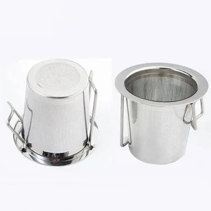 Tea infuser ball filled with loose tea leaves ready to steep
