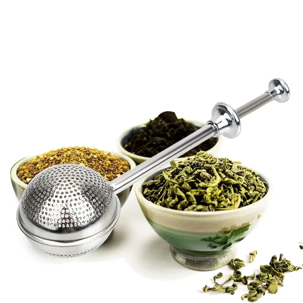 Tea infuser resting on a mug rim