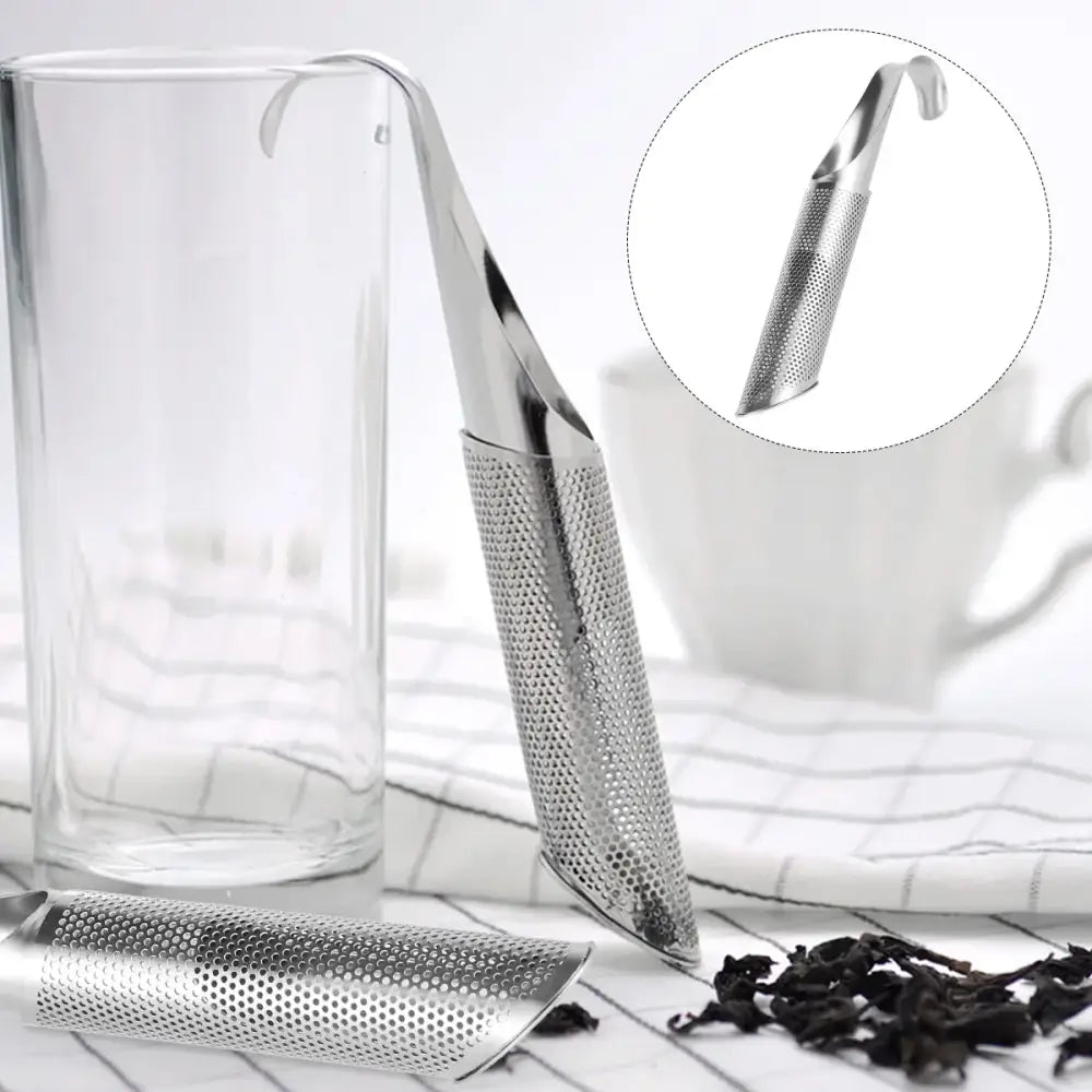 Stainless steel loose leaf tea infuser steeping in a ceramic mug