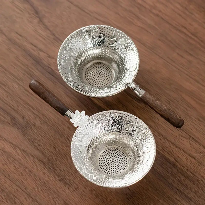 Close-up of tea strainer mesh catching loose leaves