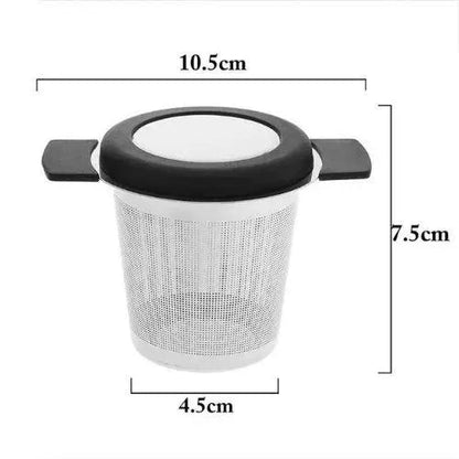 Stainless steel tea strainer size reference next to standard mug