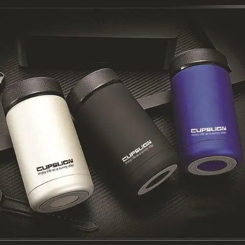 Three stainless steel tea thermoses