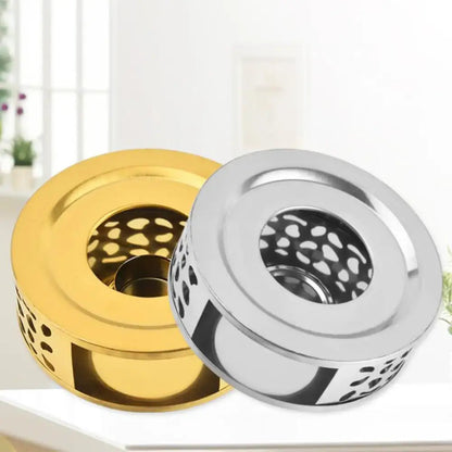 Open frame design of stainless steel candle teapot warmer allowing airflow to tea light