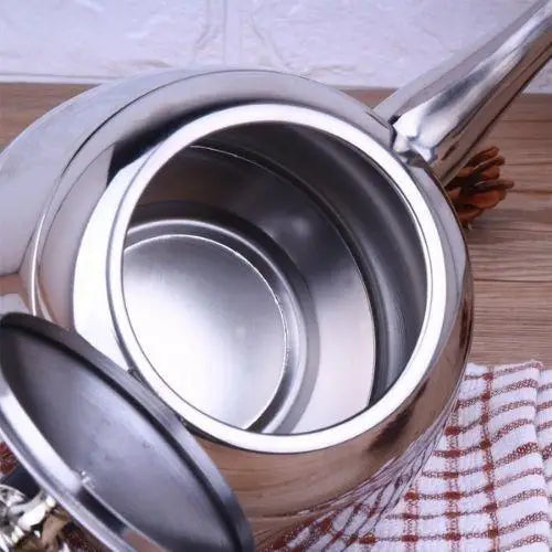Interior view of stainless steel teapot with removable filter