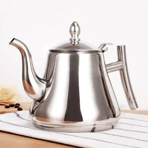 Three stainless steel teapots with infusers in different sizes