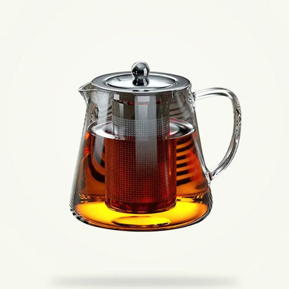 Stainless steel teapot with removable infuser basket, clean product shot on white background