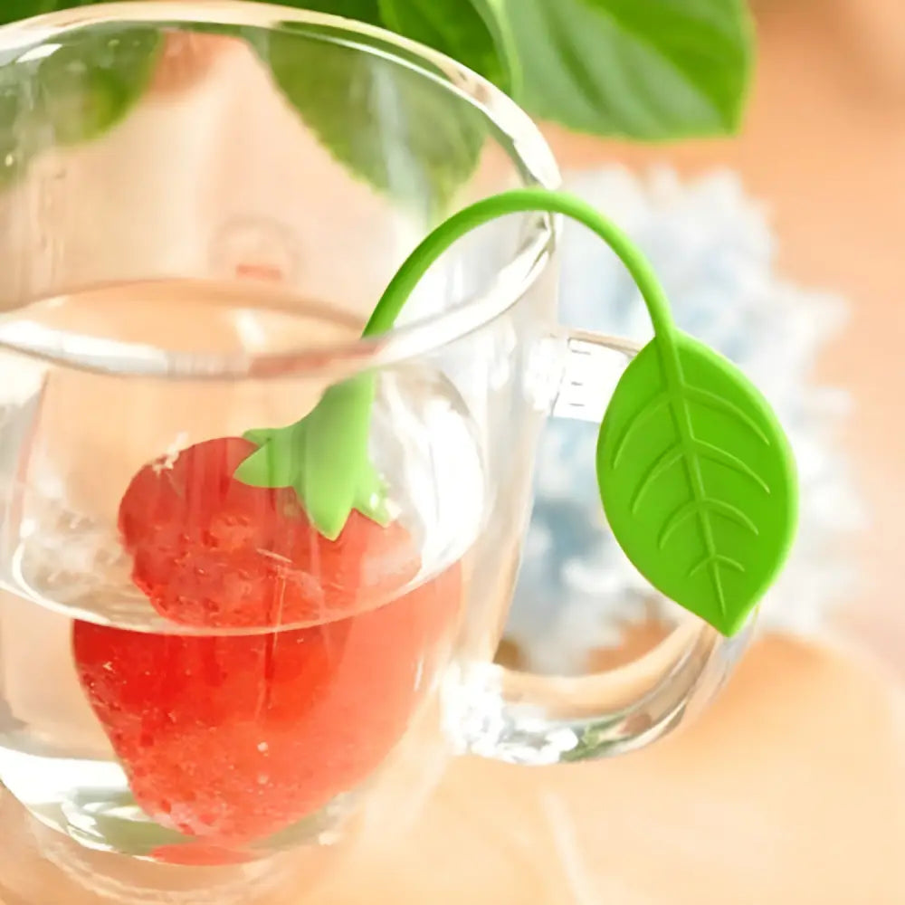 Food-grade silicone strawberry tea infuser product display flat lay