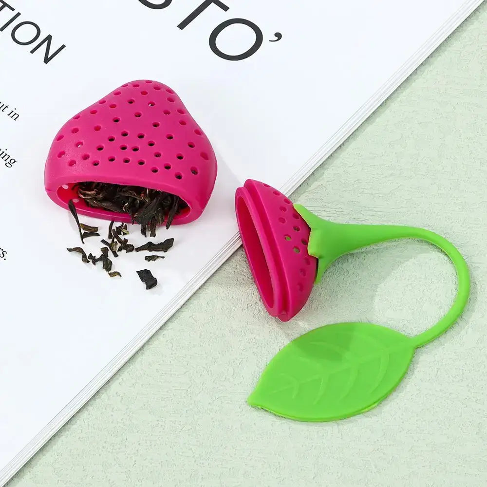 Strawberry tea infuser in green silicone