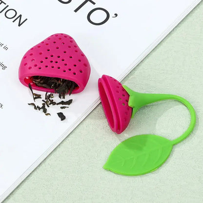 Strawberry tea infuser in green silicone