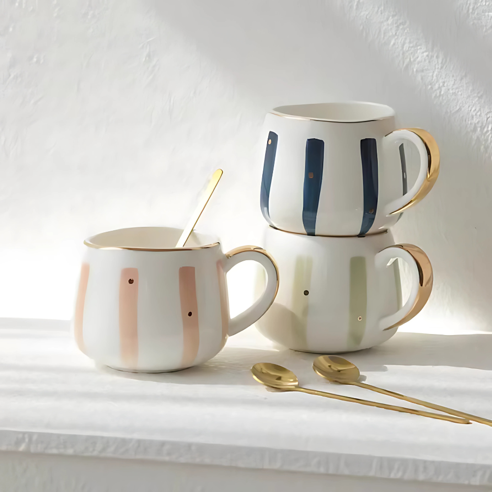 Striped porcelain tea cup with colorful glaze stripes on a saucer