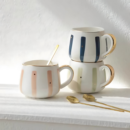 Striped porcelain tea cup with colorful glaze stripes on a saucer