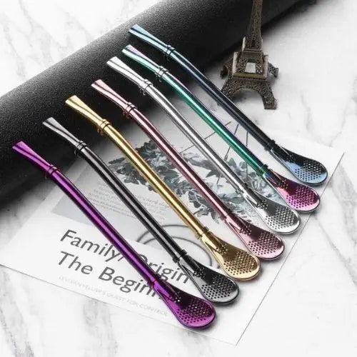 Steel tea infuser spoon with tea leaves