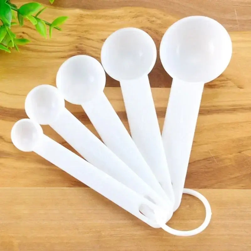 White tea measuring spoon with measurement marks