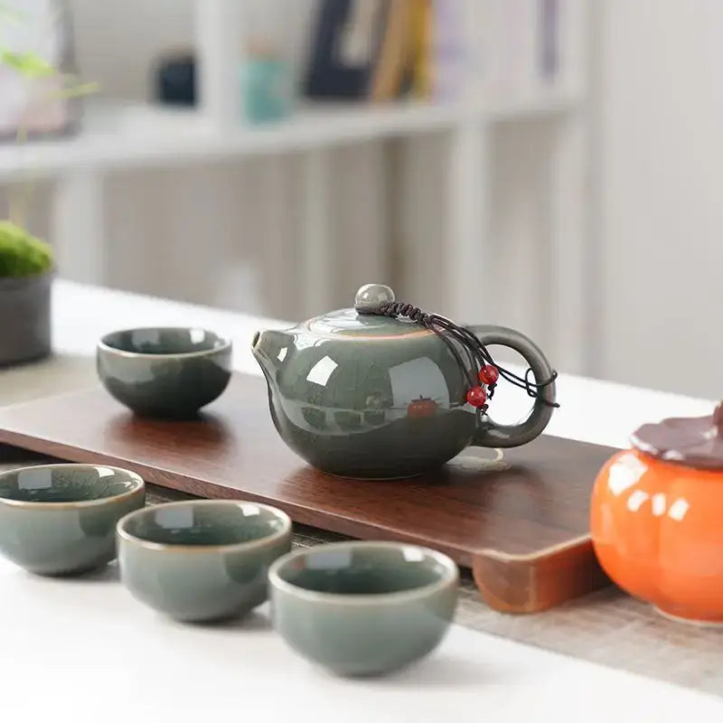 Granny Lulu ceramic teapot and cups set styled on a wooden table