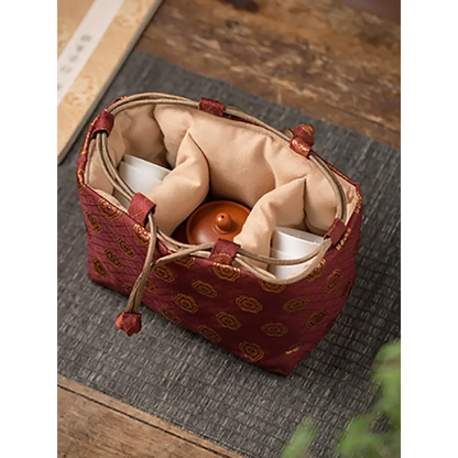 Tea set travel bag with drawstring closed, ready for transport