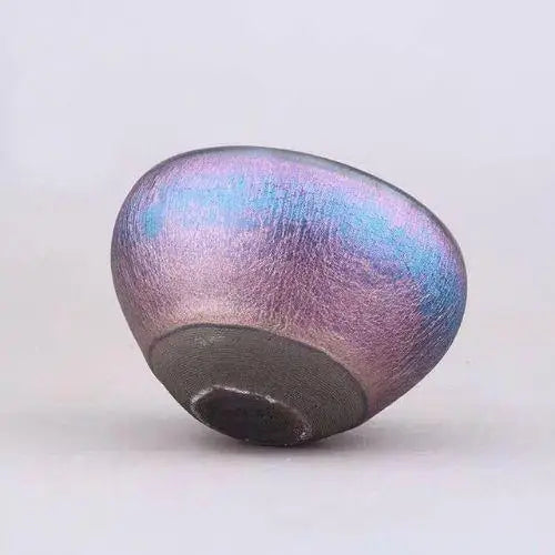 Handmade stoneware matcha bowl in traditional chawan shape, Tenmoku style, side view