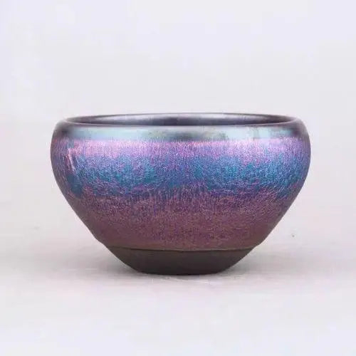 Tenmoku ceramic matcha bowl interior showing wide open mouth sized for chasen whisking