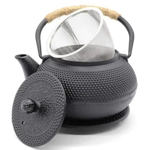 Black cast iron teapot with lid