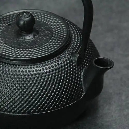 Cast iron teapot spout detail