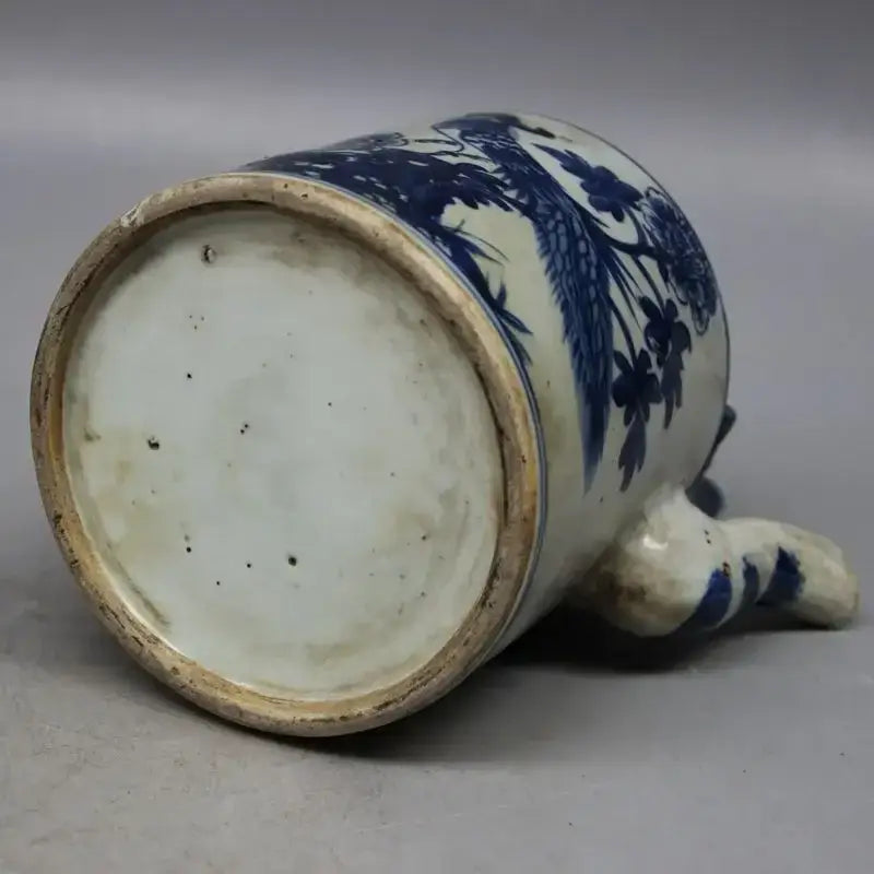 Elegant porcelain teapot with floral design, close up