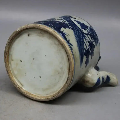 Elegant porcelain teapot with floral design, close up