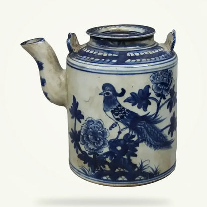 Traditional Porcelain Teapot with Floral Motifs, product photo on a plain background