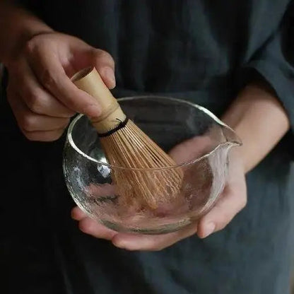 Glass chawan tea bowl with bamboo whisk for matcha