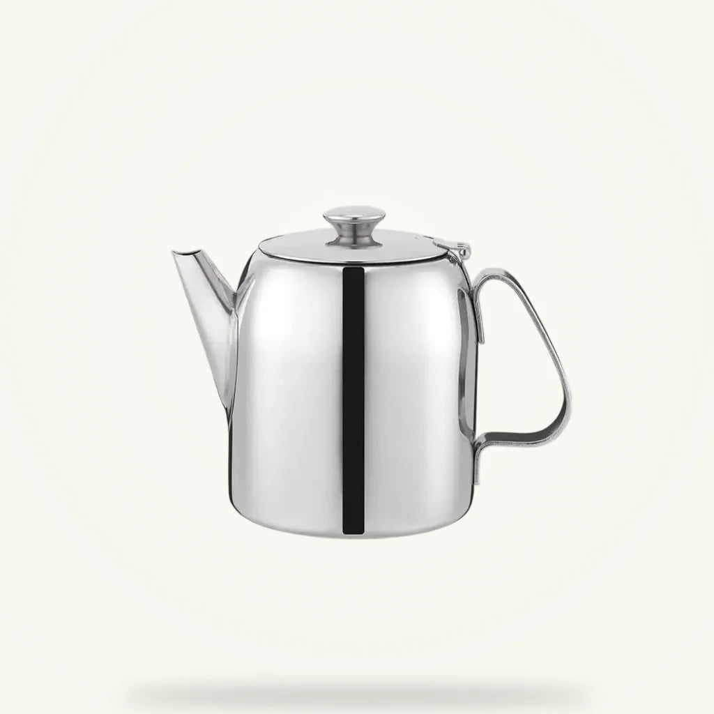 Tunisian stainless steel teapot with infuser on plain background, polished finish