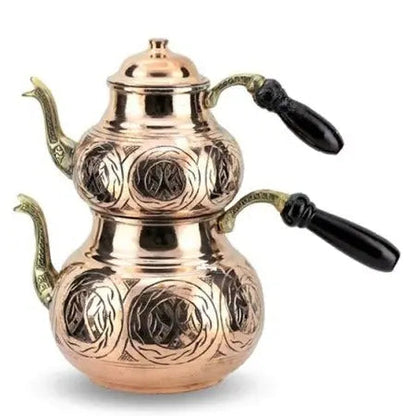 Handcrafted Turkish copper çaydanlık with black heat-resistant handle, side view