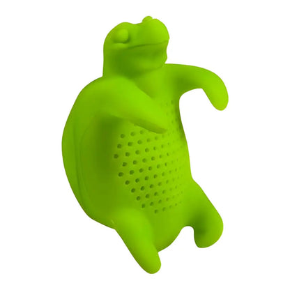 Silicone turtle shaped loose leaf tea strainer on a wooden surface