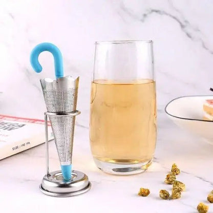 Umbrella tea infuser in a steaming mug showing steam rising from loose leaf tea