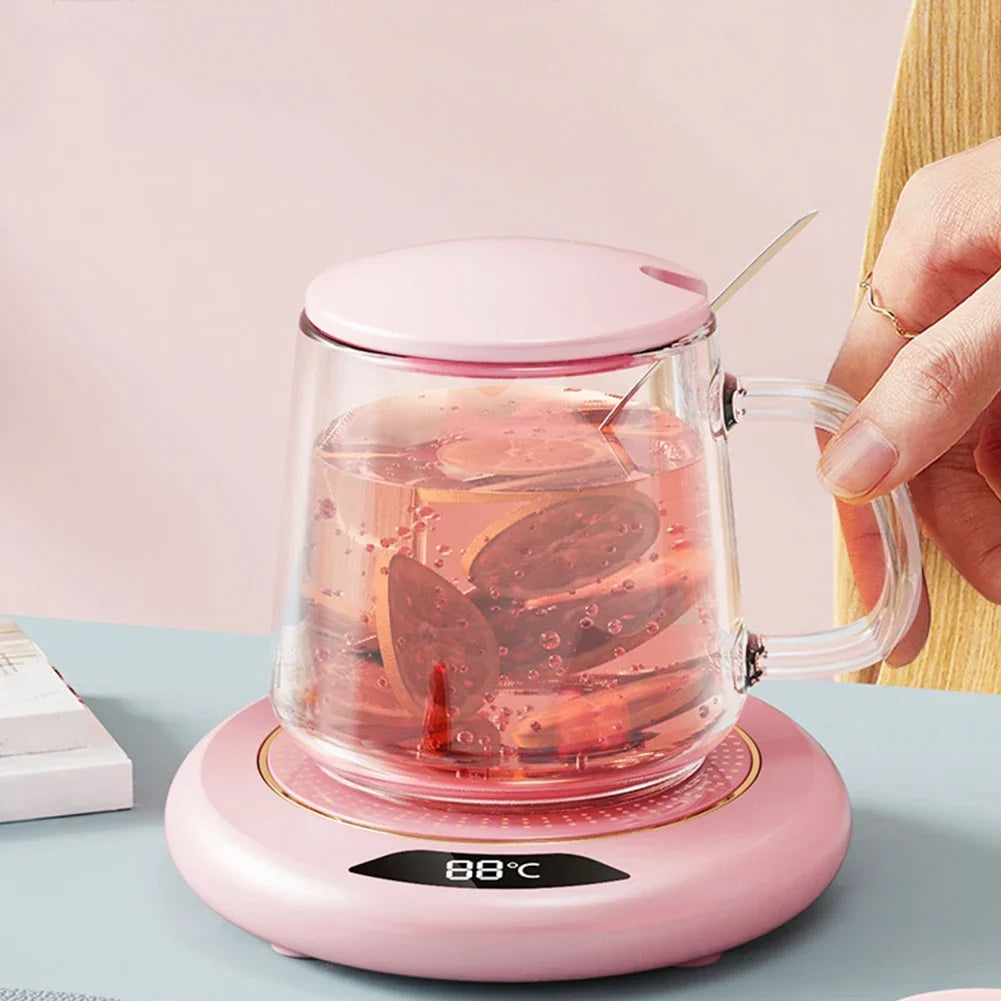 Pink USB mug warmer with a cup of hot tea on top