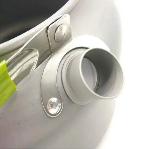 Close-up of drip-free spout on vintage aluminum stovetop kettle