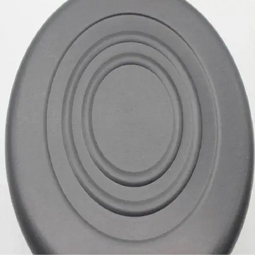 Flat base of 1200 ml aluminum tea kettle on wooden table