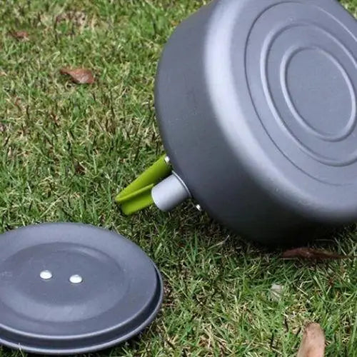 Green insulated lid knob on vintage aluminum kettle